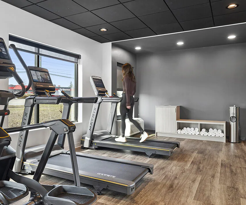 Woman on a tread mill.