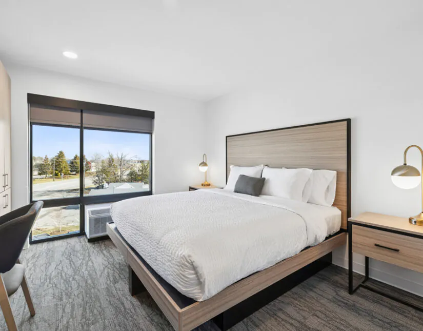 A king master bedroom in the apartment style suite.